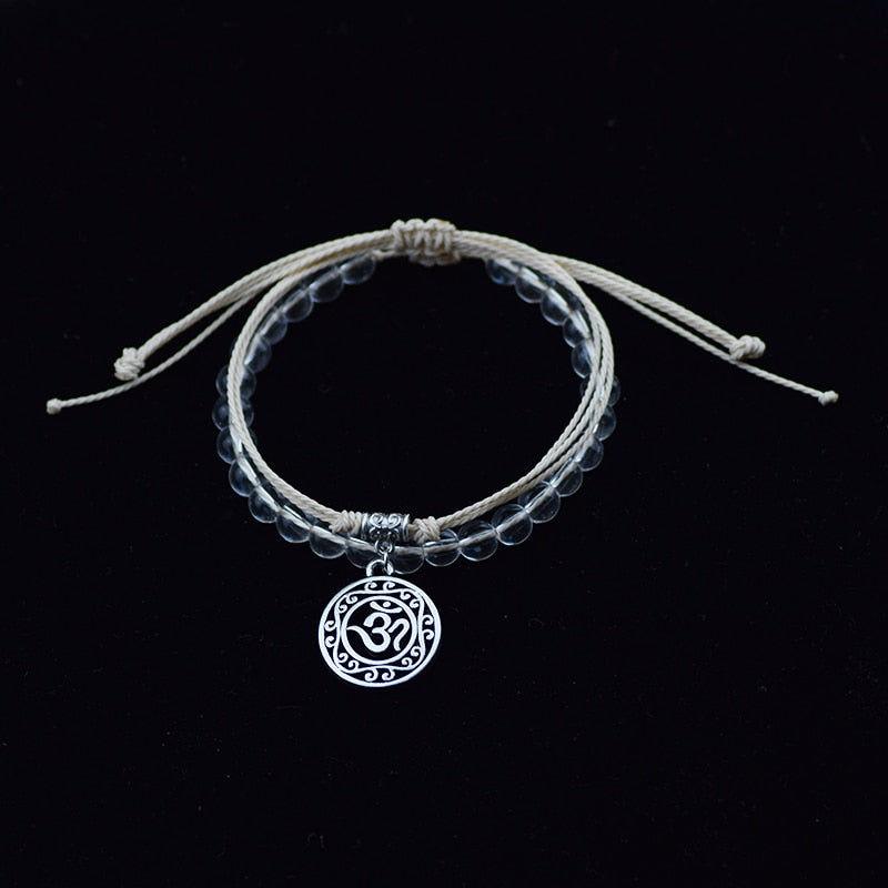Bracelet de perle et corde symbole Hindou "Om", beige
