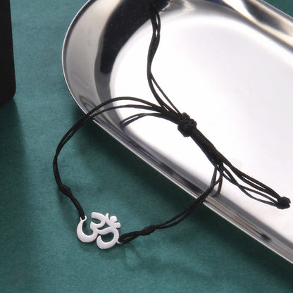 Bracelet de corde avec symbole Hindou "Om" noir